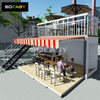 Zweist&ouml;ckiges Caf&eacute; mit erweiterbarem Containerhaus im Balkondesign