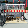 Zweist&ouml;ckiges Caf&eacute; mit erweiterbarem Containerhaus im Balkondesign